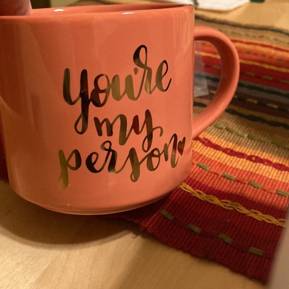 New salmon colored “you’re my person” in gold lettering mug